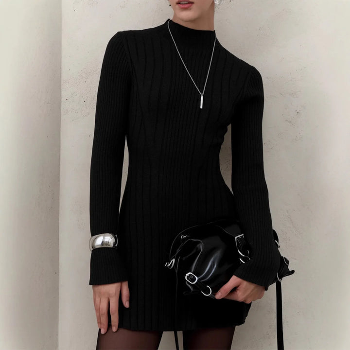 Black ribbed knit sweater dress with mock neck close up