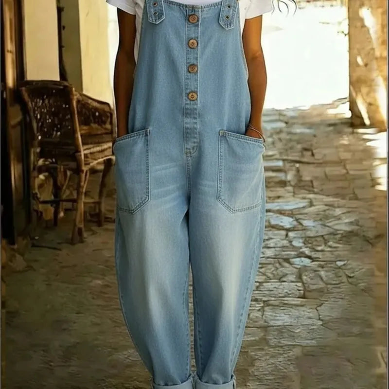 Light blue denim overalls with button front and patch pockets