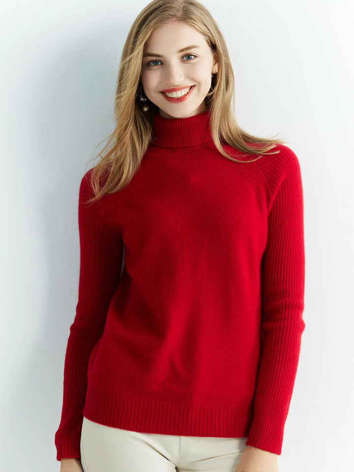 Smiling woman wearing maroon turtleneck sweater