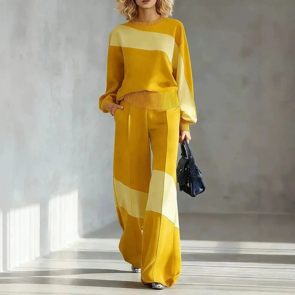 Woman wearing yellow color block sweater and wide leg pants set