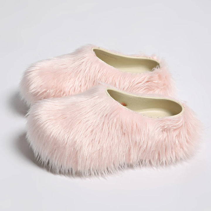 Light pink faux fur slipper mules, angled view