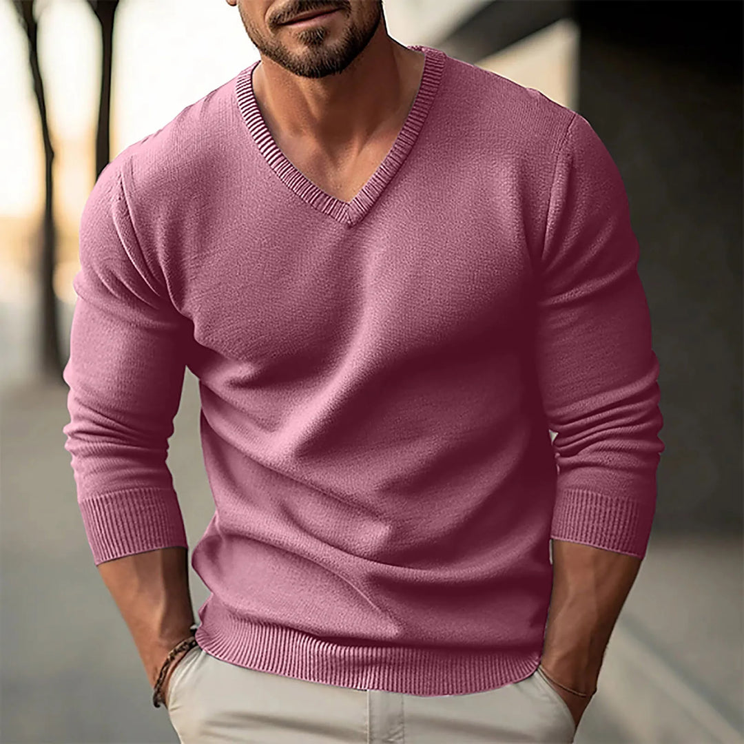 Man wearing pink V-neck knit sweater