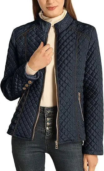 Woman wearing navy blue quilted puffer jacket close up