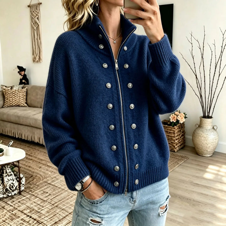 Woman wearing navy blue stand collar zip cardigan with button details