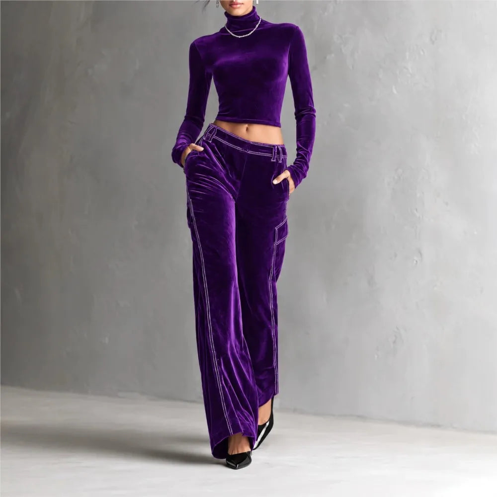 Woman wearing purple velvet cropped turtleneck and wide leg cargo pants set