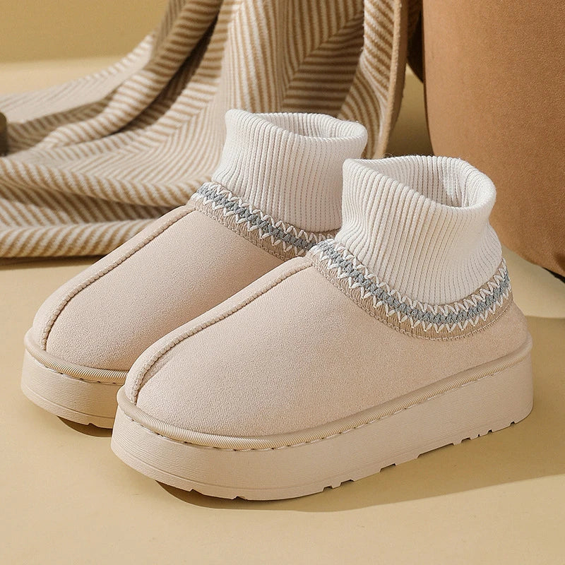 Beige plush ankle boots with ribbed knit collar, side view