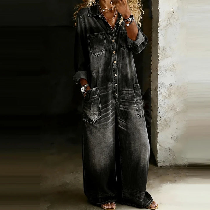 Black denim jumpsuit with wide leg and chest pockets