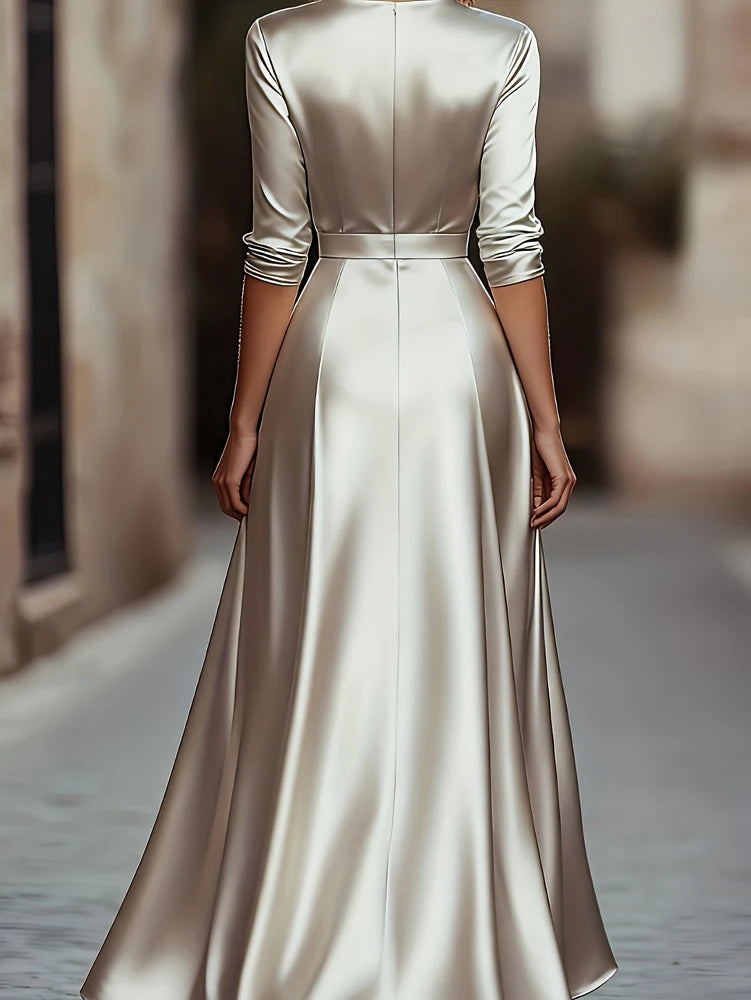 Apricot satin maxi dress, back view showing seaming