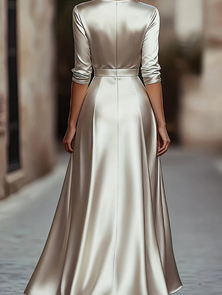 Apricot satin maxi dress, back view showing seaming