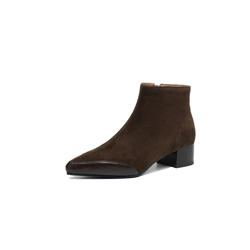 Brown suede ankle boot with contrast leather toe cap on white background