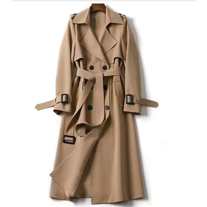 Camel belted trench coat on hanger, front view