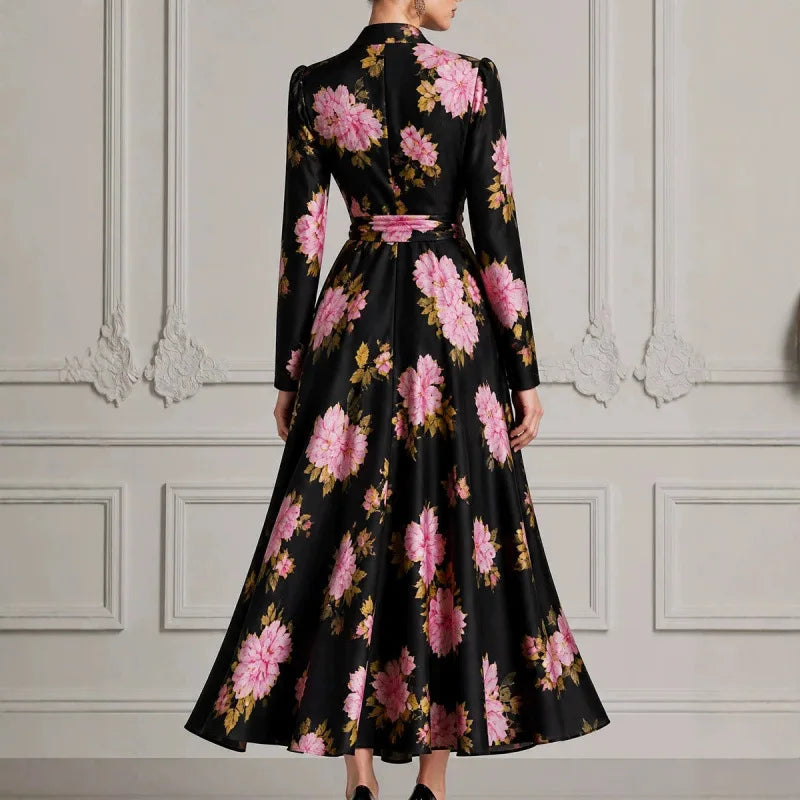 Back view of black floral wrap dress with tie belt