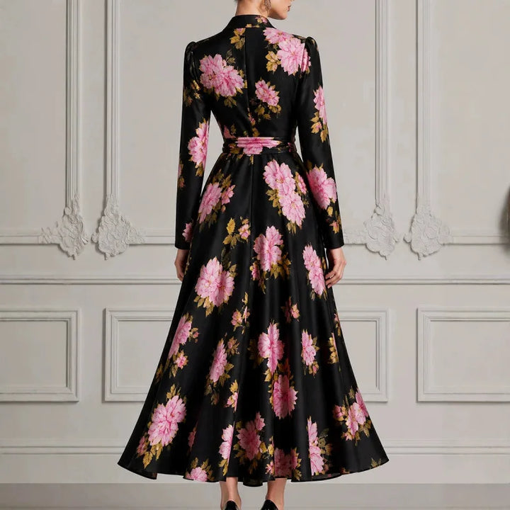 Back view of black floral wrap dress with tie belt