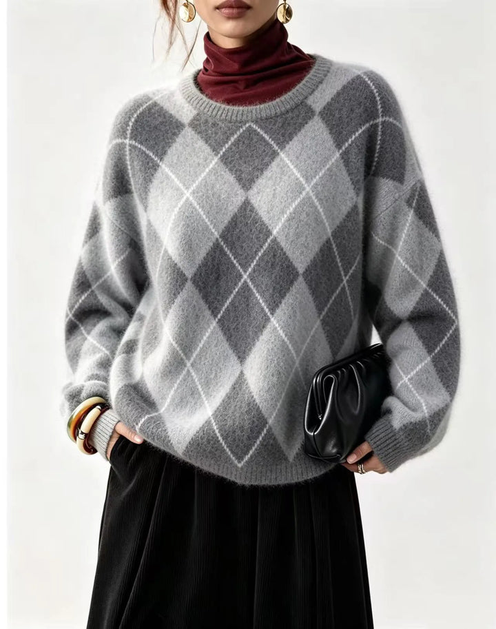 Woman wearing gray argyle knit sweater with burgundy turtleneck