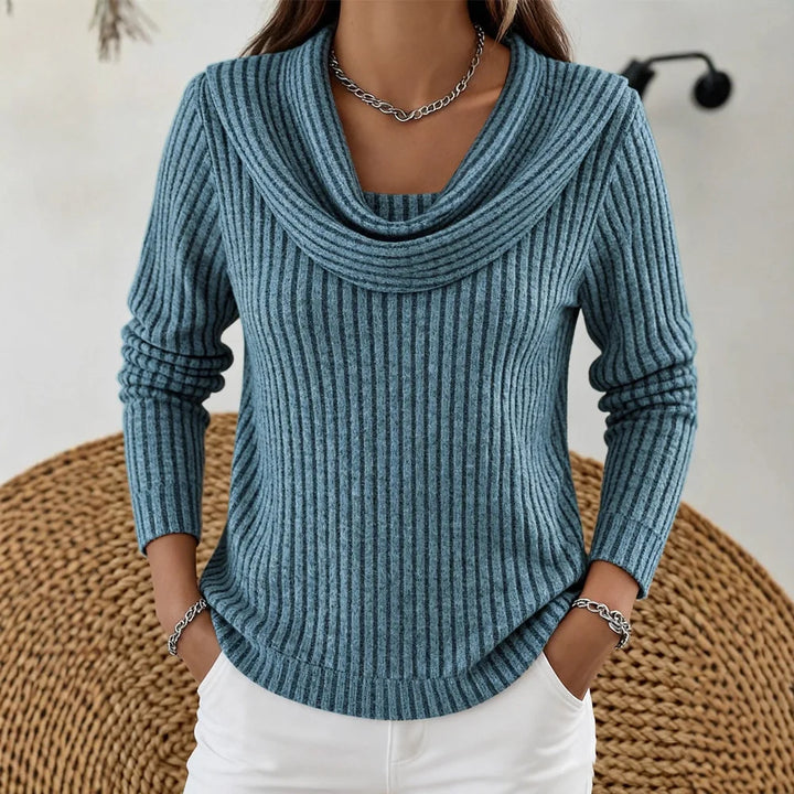 Blue ribbed knit top with cowl neckline, close view