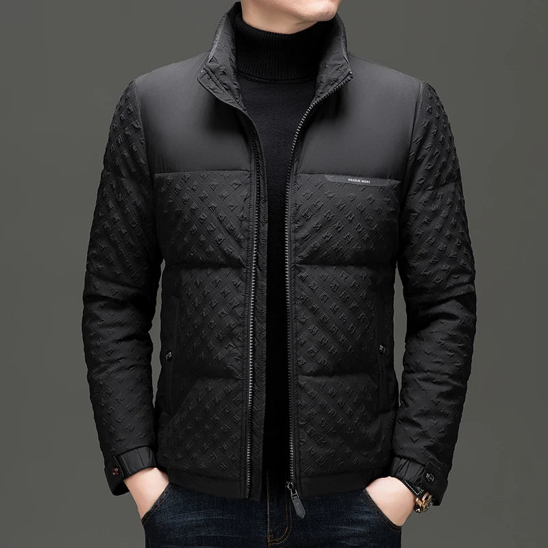 Man wearing black quilted puffer jacket with stand-up collar, front view
