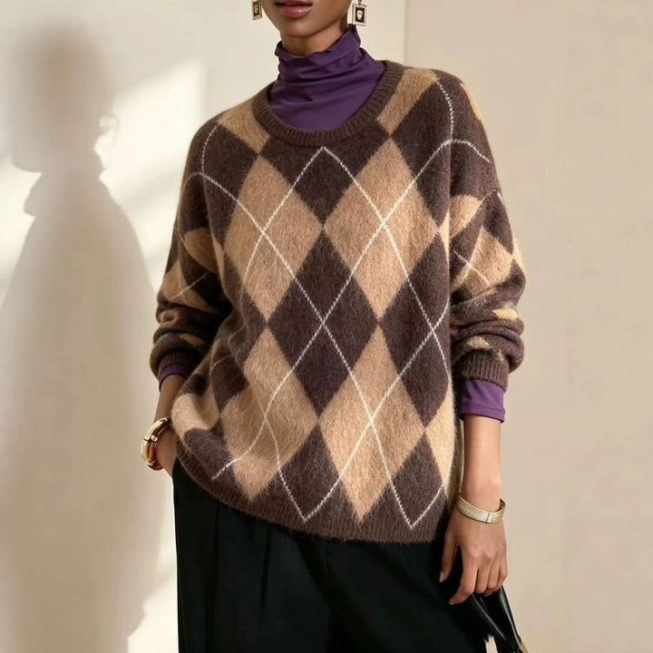 Woman wearing brown and tan argyle knit sweater with purple turtleneck