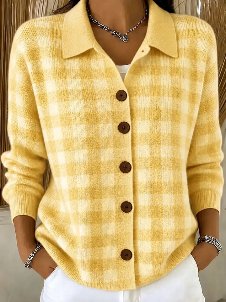 Woman wearing yellow gingham knit cardigan with collar and button front