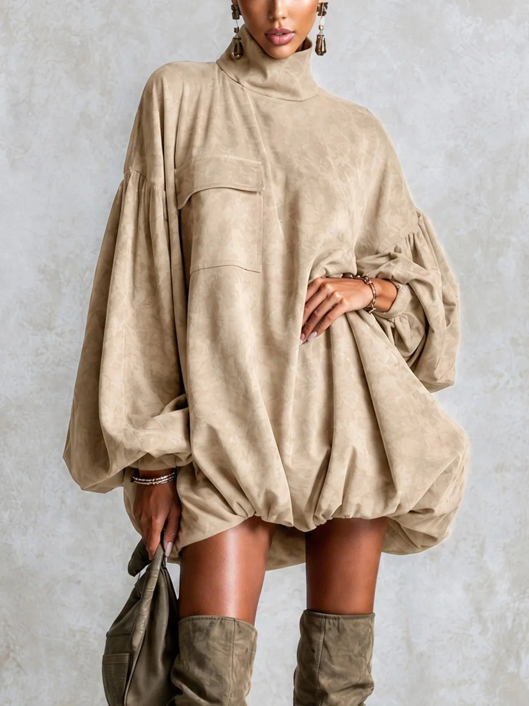 Woman wearing khaki turtleneck lantern sleeve mini dress, front view