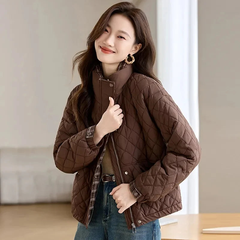 Woman wearing coffee brown quilted puffer jacket with stand collar