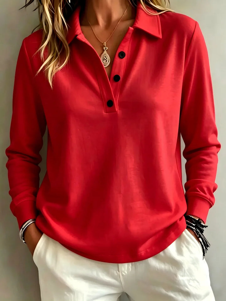 Red long sleeve polo shirt with button placket, close-up