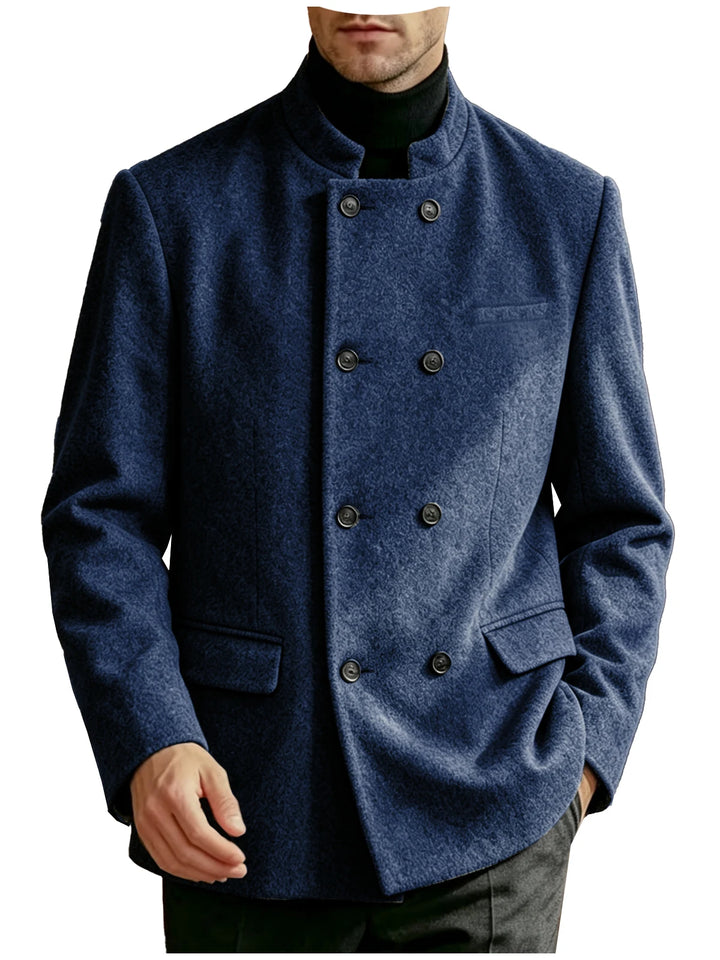 Man wearing navy blue mandarin collar double-breasted coat