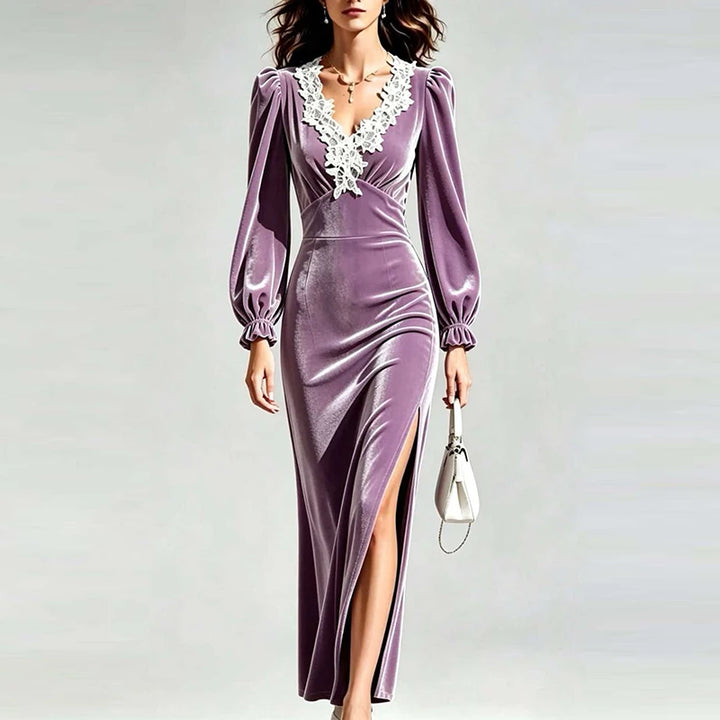 Model in purple velvet maxi dress with lace trim neckline