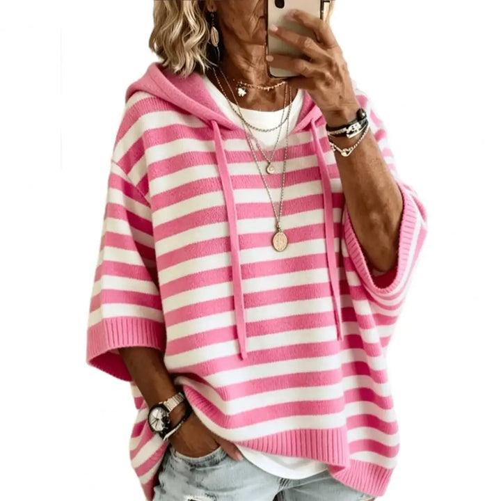 Pink and white striped hooded sweater close up