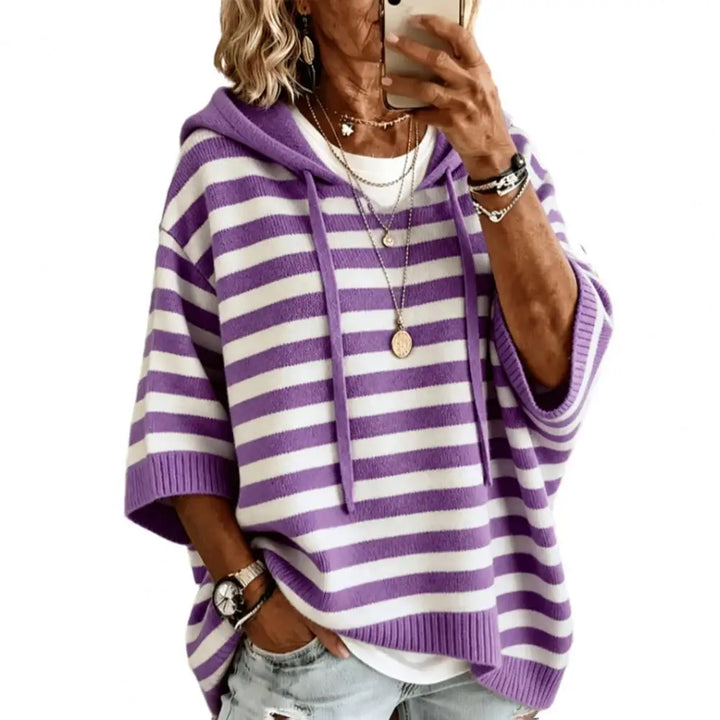 Purple and white striped hooded sweater close up