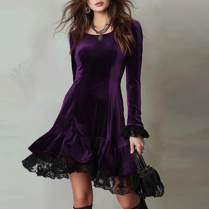 Woman wearing purple velvet mini dress with lace trim