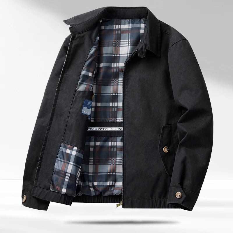 Black jacket open showing plaid lining and interior pocket