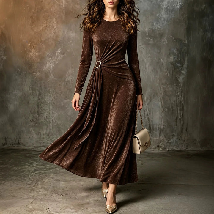 Coffee velvet maxi dress styled with gold handbag, front view