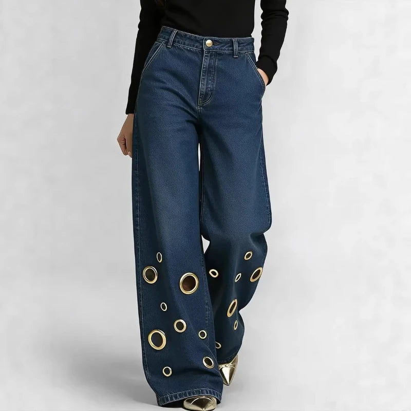 Wide leg jeans with grommet cutouts in dark blue, front view