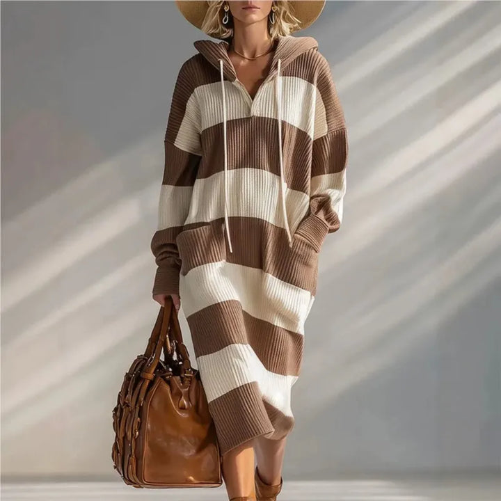 Woman wearing brown and cream striped hooded sweater dress