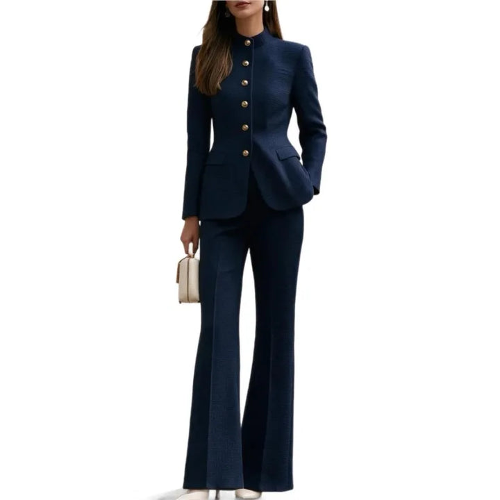 Woman wearing navy blue tweed stand collar blazer and flared trousers set