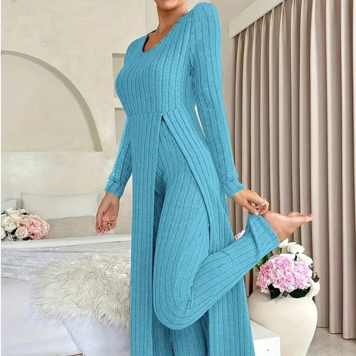 Woman wearing teal blue ribbed long slit two piece loungewear set