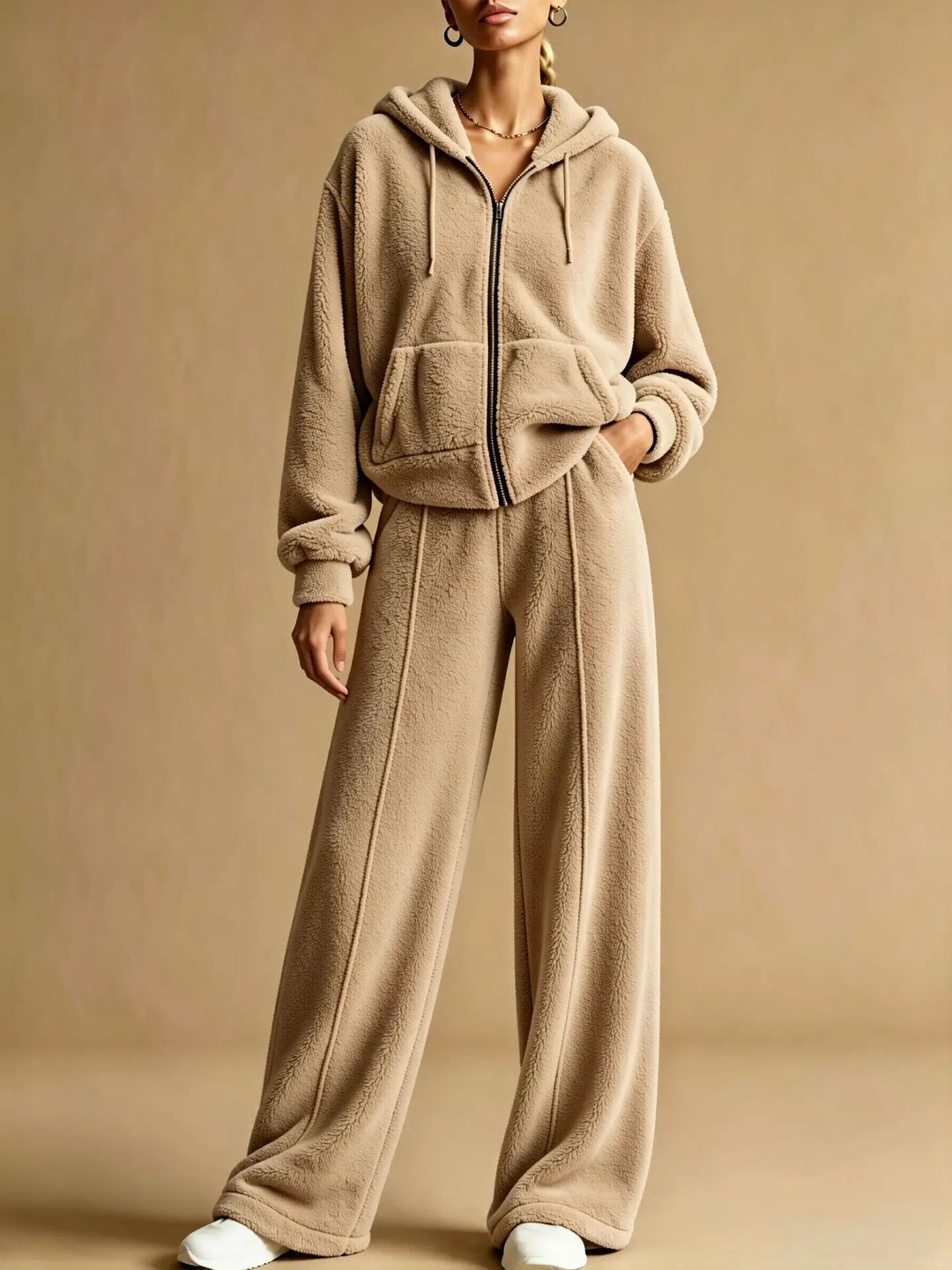 Woman wearing khaki sherpa hoodie and wide leg pants set