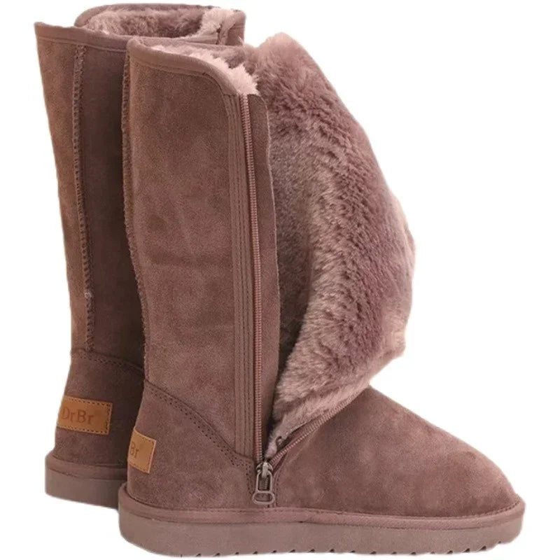 Brown knee-high snow boots with side zip and fur lining