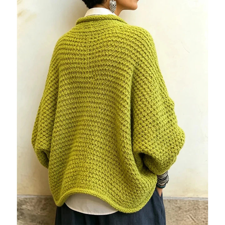 Back view of chartreuse green chunky knit wrap cardigan with batwing sleeves