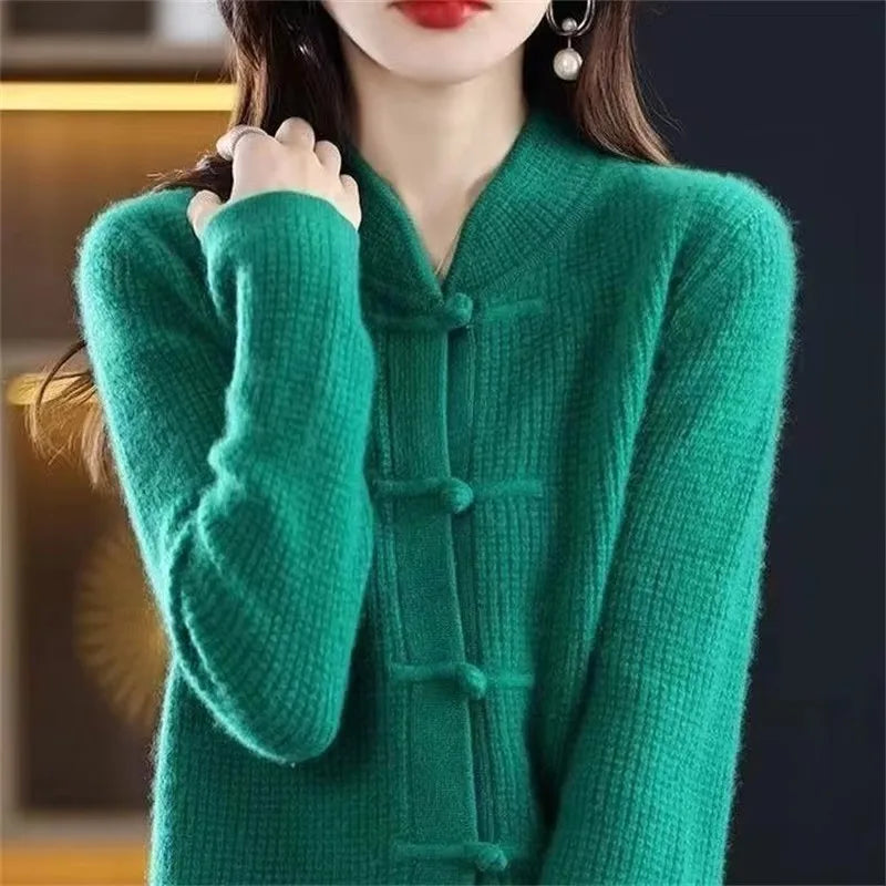Green knit cardigan with stand collar and frog buttons