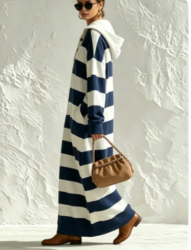 Side profile of striped sweatshirt maxi dress with hood-like collar