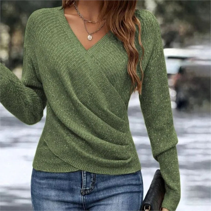 Woman wearing army green ribbed knit wrap-front sweater with V-neck