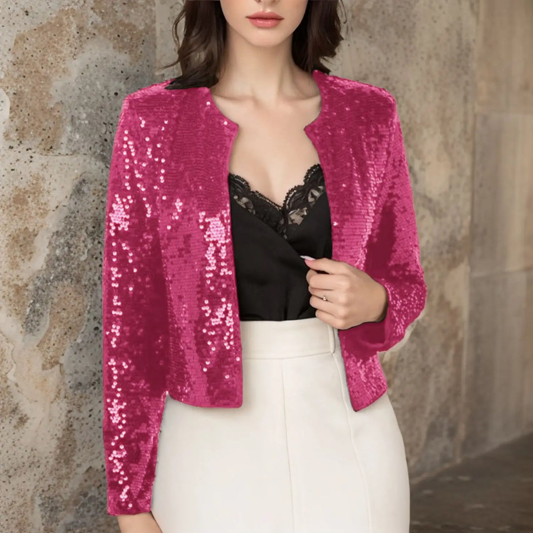 Rose red sequin cropped jacket worn open over black lace top