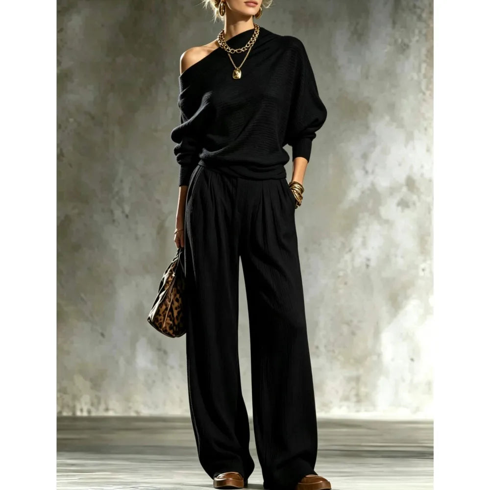 Black off shoulder batwing sleeve knit top and wide leg pants set, front view
