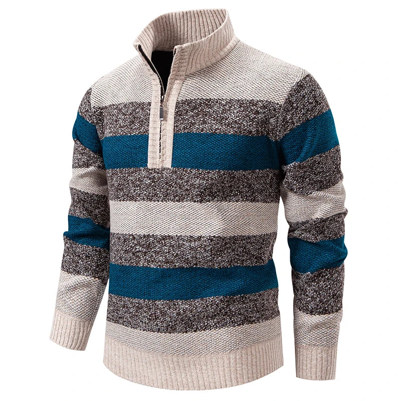 Man wearing beige blue brown striped quarter zip sweater, front angle view