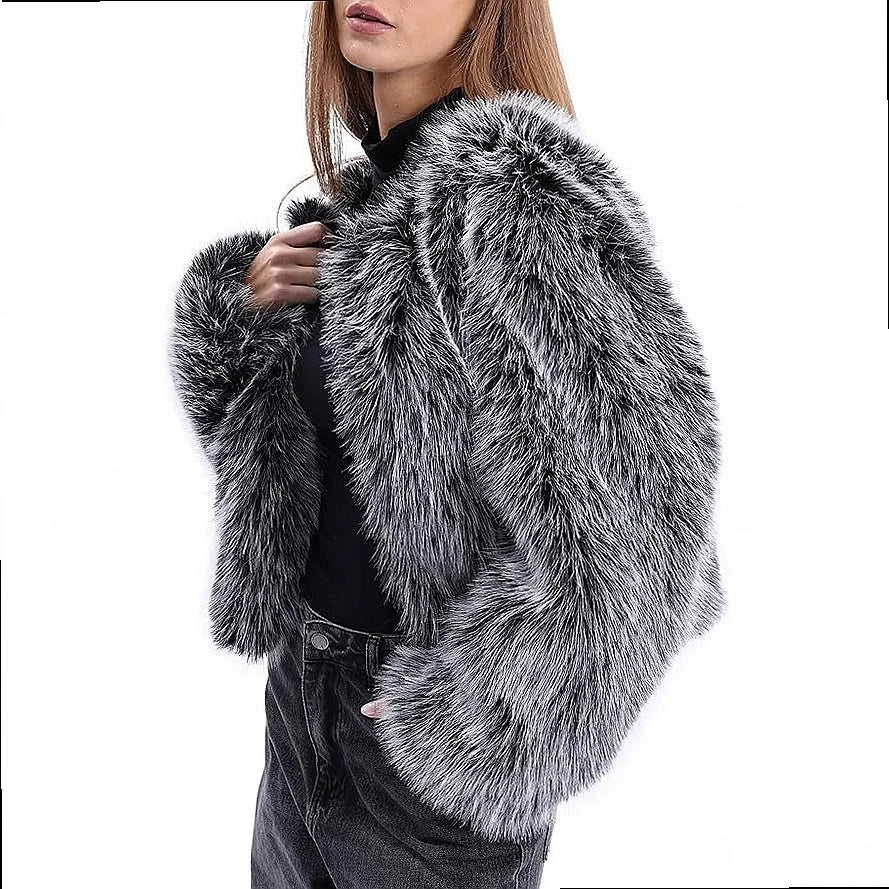 Side view of black and white faux fur cropped coat