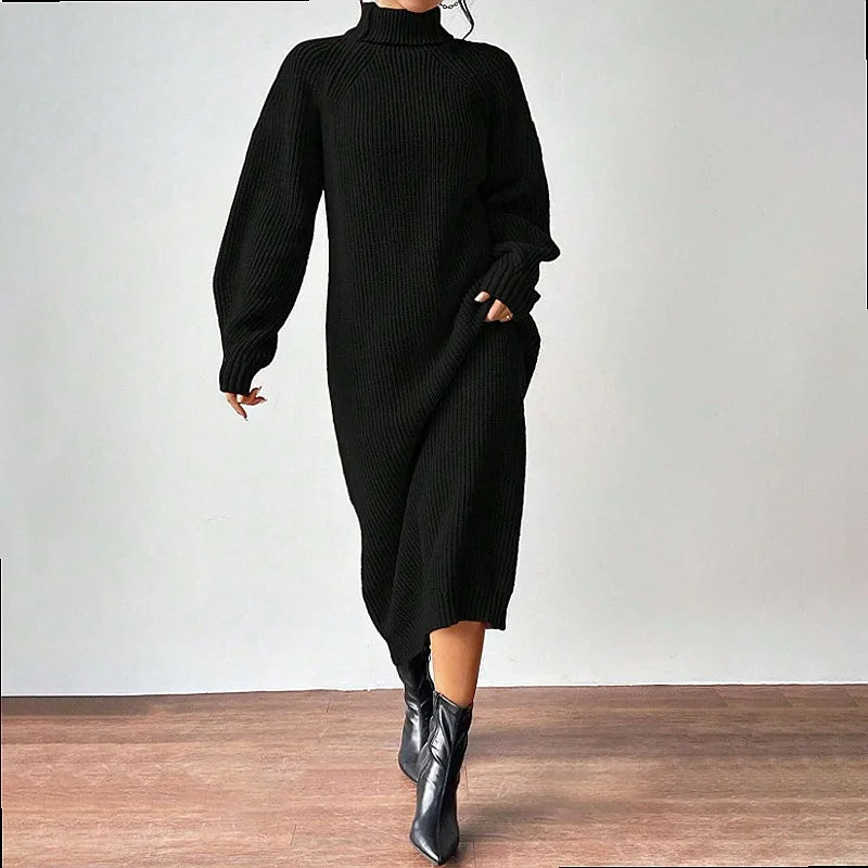Black ribbed knit turtleneck sweater dress, walking front view