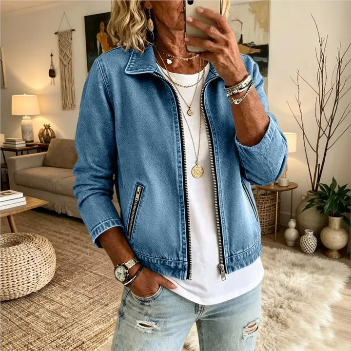 Woman wearing sky blue denim zip front jacket with turn down collar