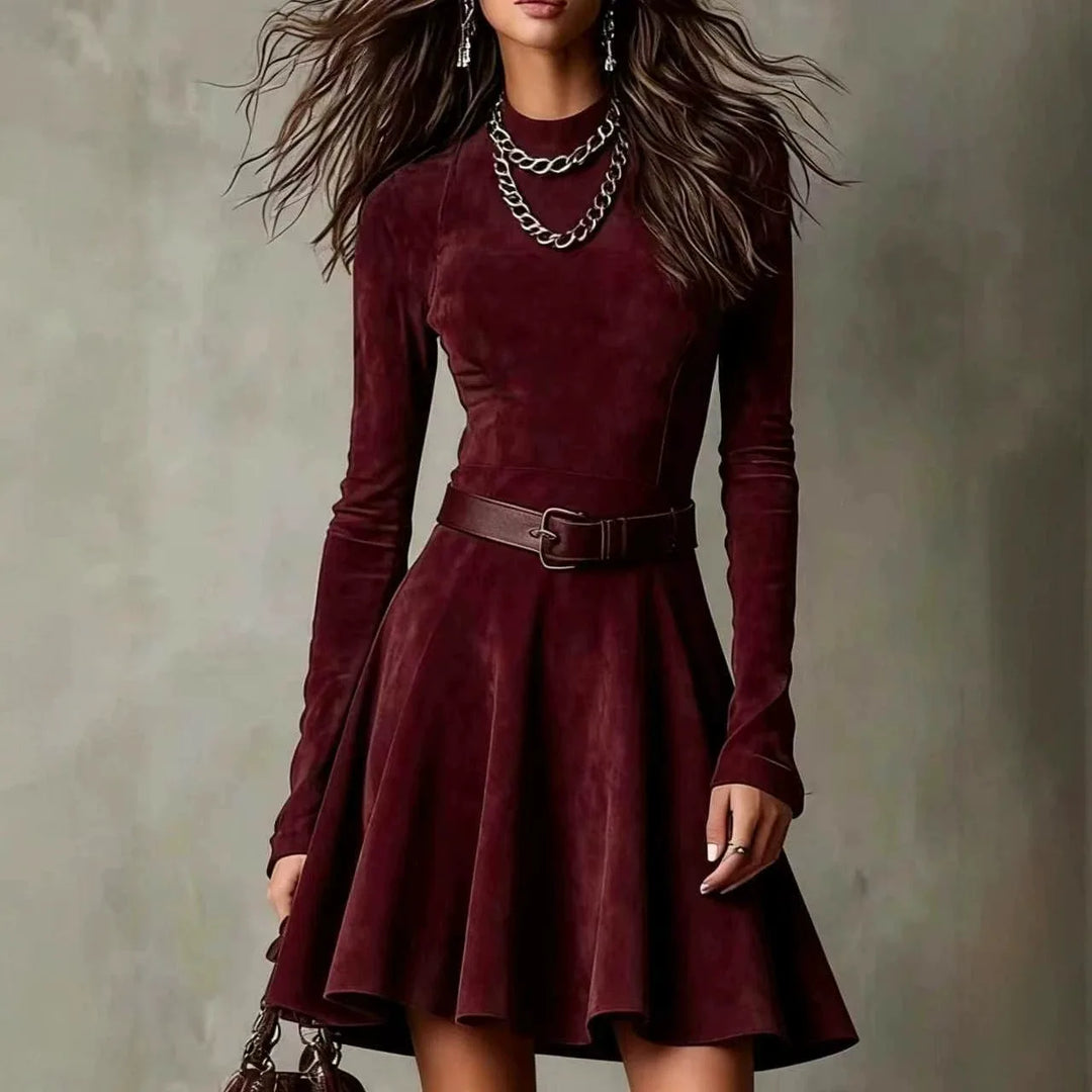 Woman wearing burgundy suede-look fit-and-flare mini dress with belt, front view