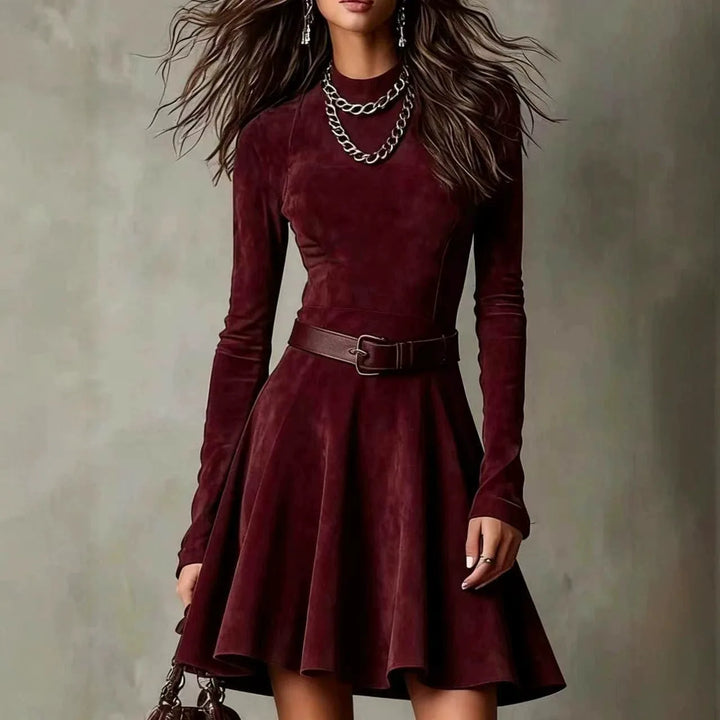 Woman wearing burgundy suede-look fit-and-flare mini dress with belt, front view